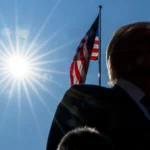 moral-courage President Trump with sun and American flag behind him